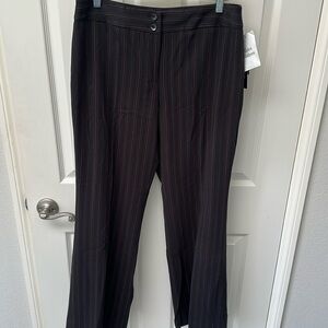 Brand NWT black slacks with pink (very fine) stitches. Soft and comfy